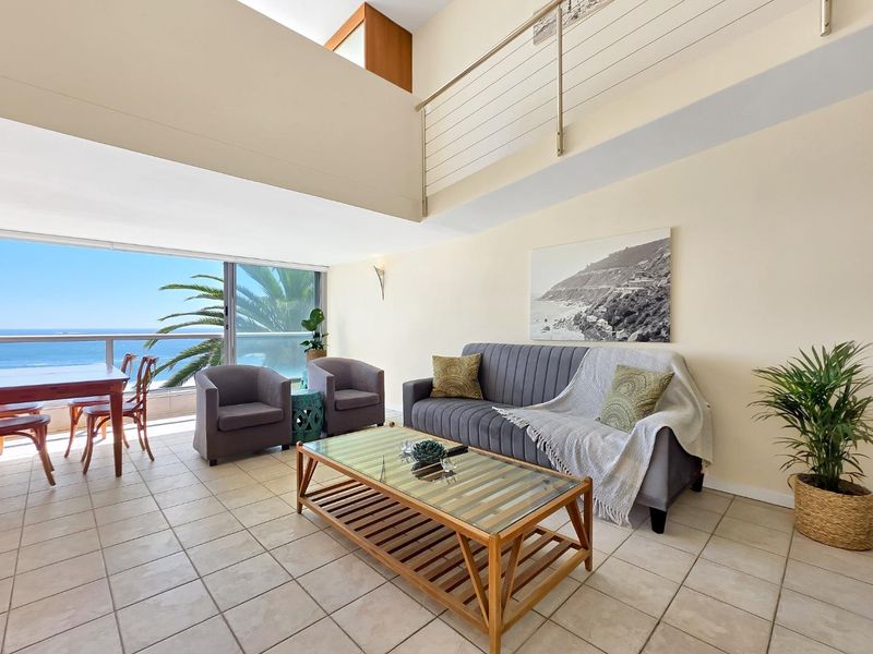 Sensational views from this one bedroom duplex apartment - Photo 4