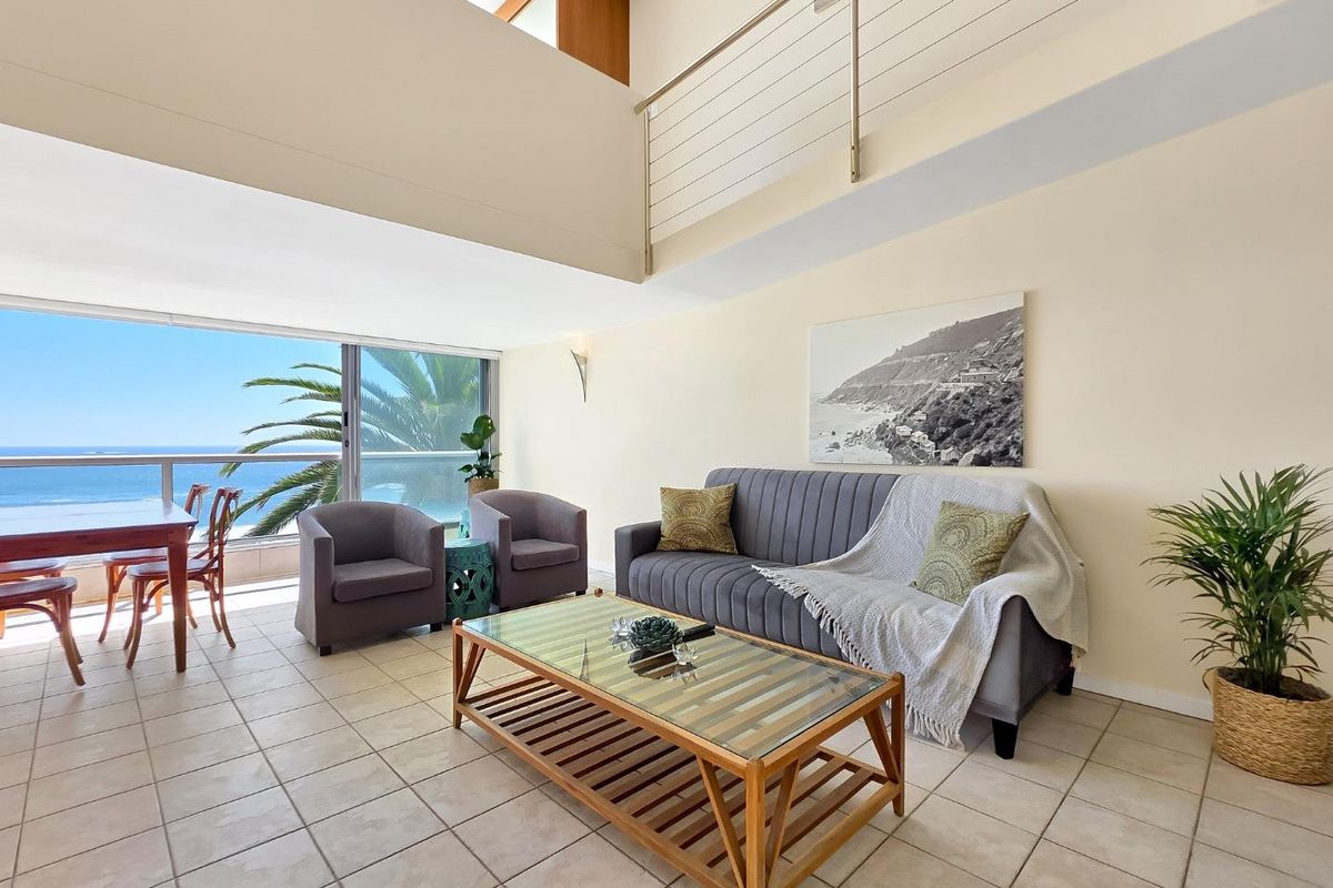 Sensational views from this one bedroom duplex apartment - Photo 4