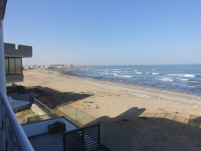 COASTAL ELEGANCE MEETS INVESTMENT OPPORTUNITY - Photo 2