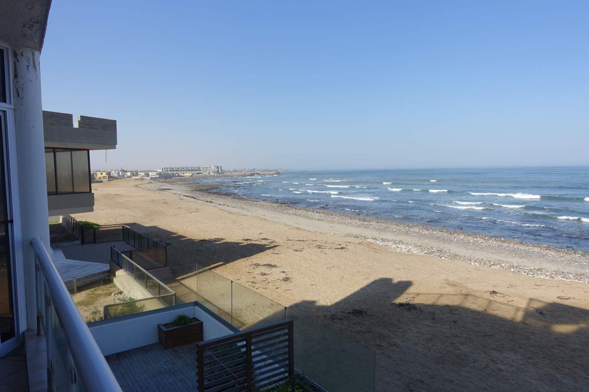 COASTAL ELEGANCE MEETS INVESTMENT OPPORTUNITY - Photo 2