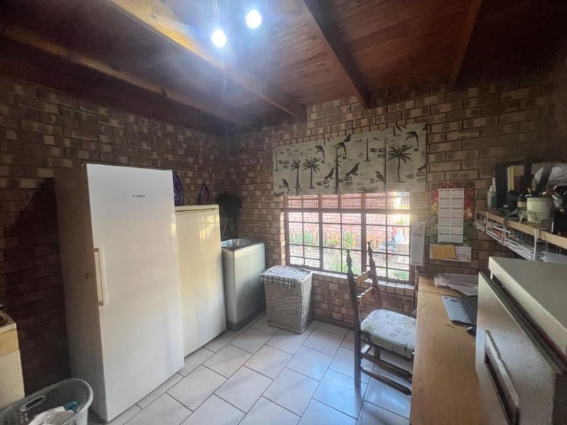 Expansive Property with Main House & Income-Generating Second Property - Photo 8