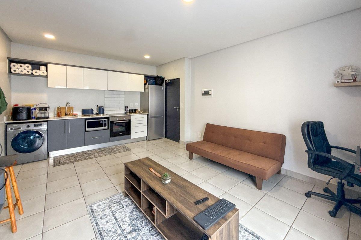 Modern City Gem | Perfect Starter, Stylish Living, Prime Location - Photo 3