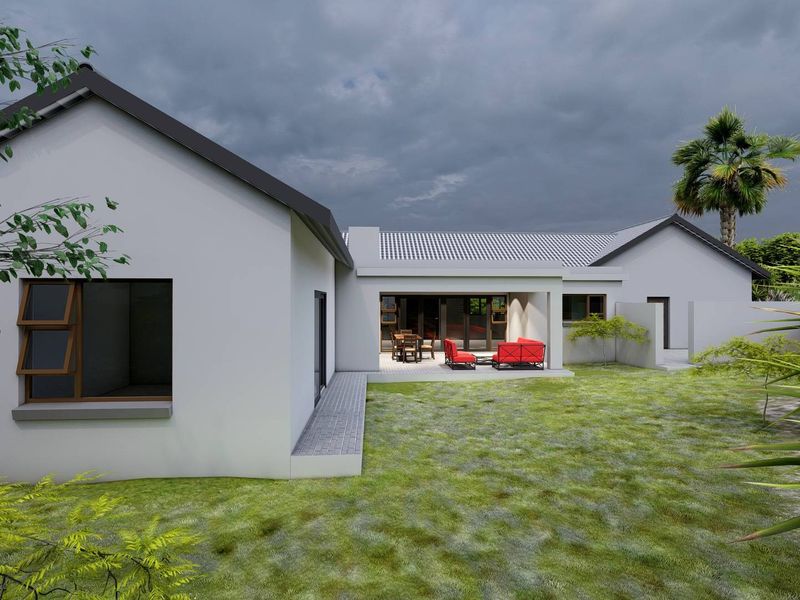 Rear view of a modern house featuring a covered patio, well-maintained lawn, and clean architectural lines under a cloudy sky.
