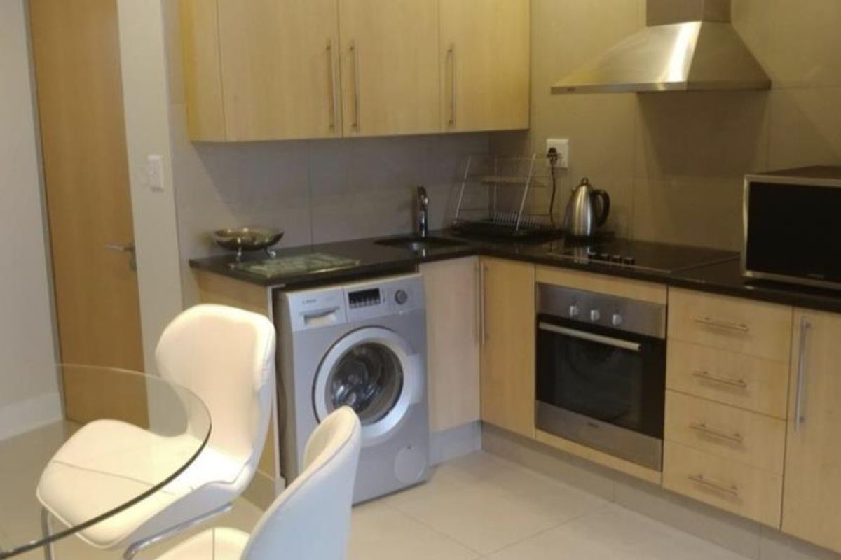 A MODERN ONE BEDROOM FURNISHED APARTMENT - Photo 5
