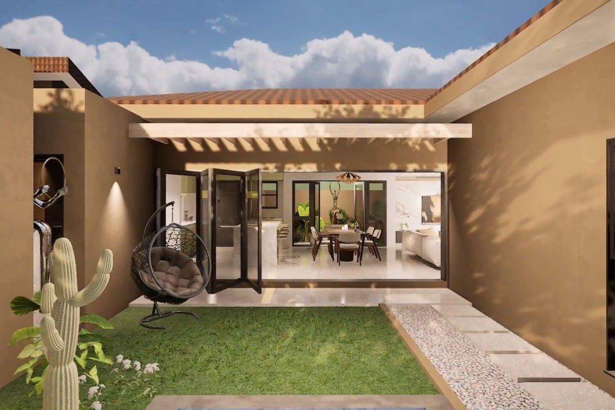 A modern courtyard featuring a manicured lawn, stone pathway, and a covered patio area with seamless indoor-outdoor flow through large folding glass doors.