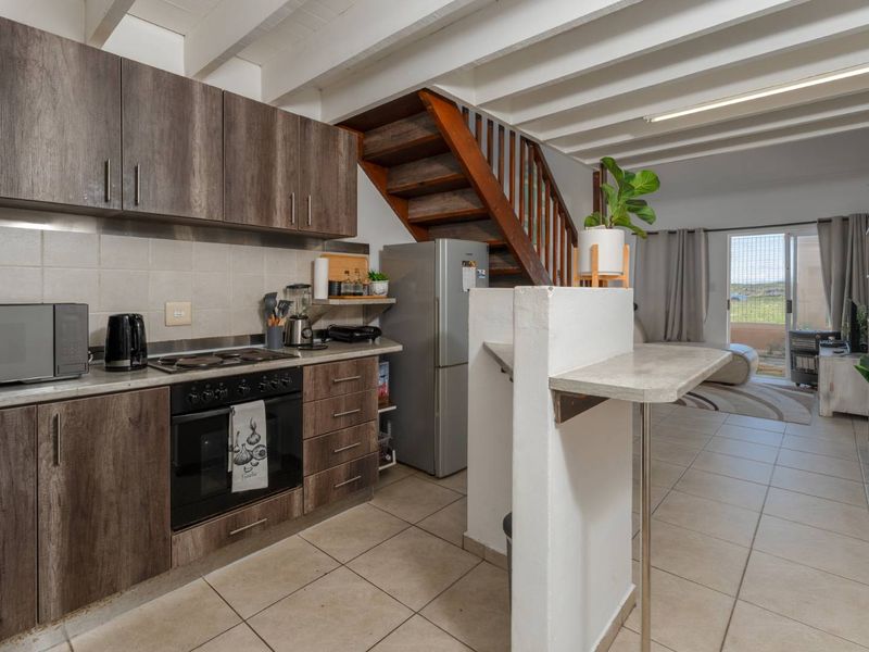 Secure Family Living in Sought-After Capricorn Beach Estate. - Photo 5