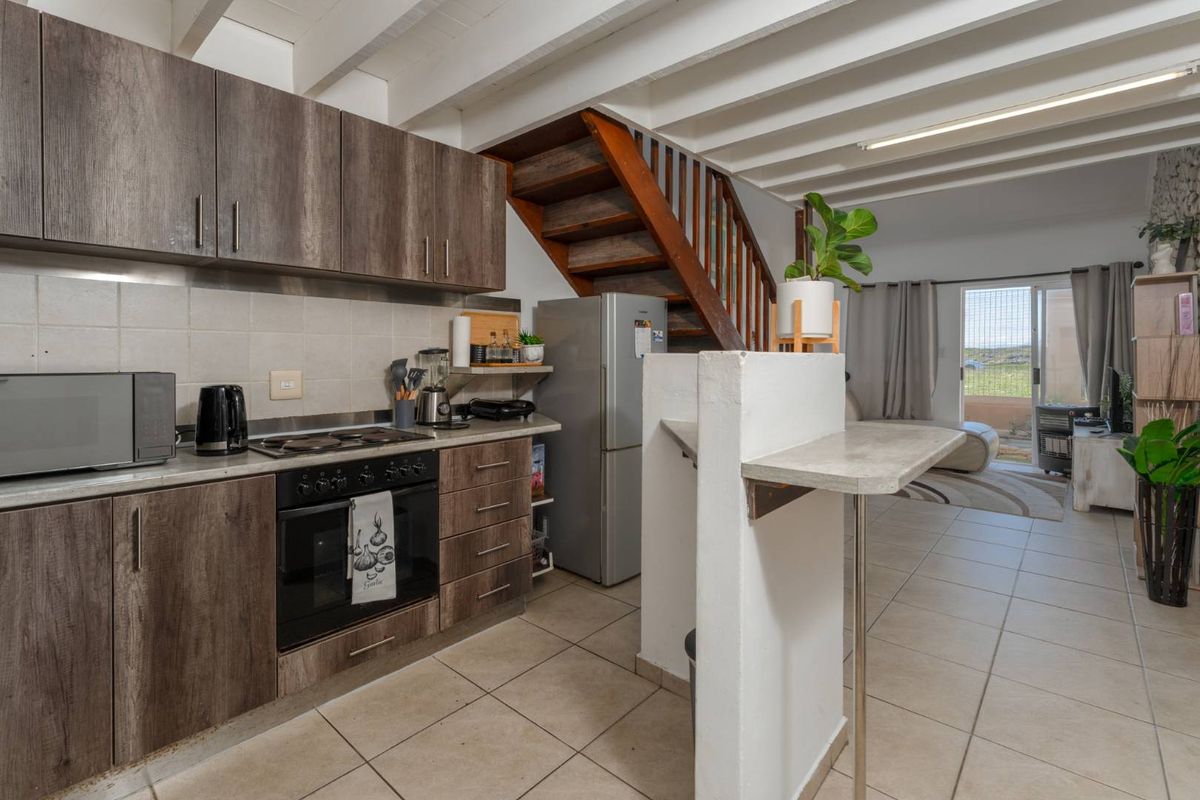 Secure Family Living in Sought-After Capricorn Beach Estate. - Photo 5