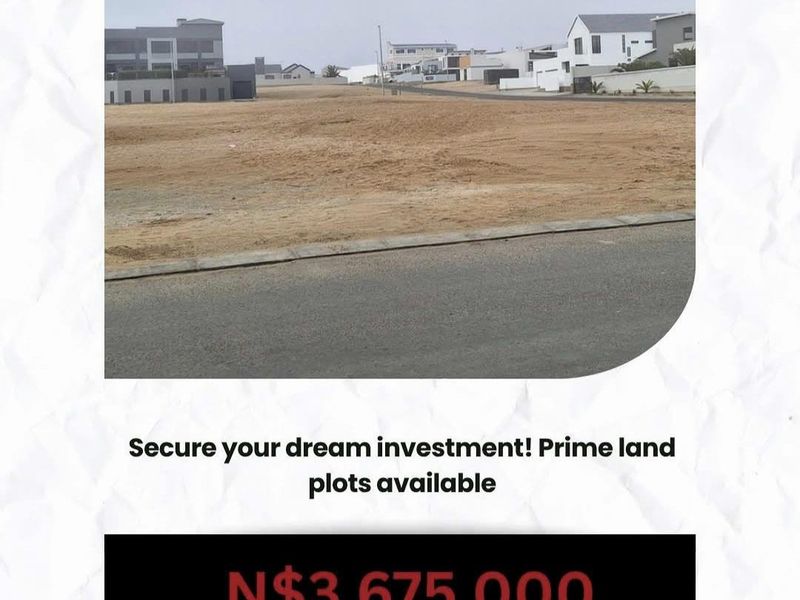A vacant residential land plot situated in a developed neighborhood with paved road access and established surrounding properties.