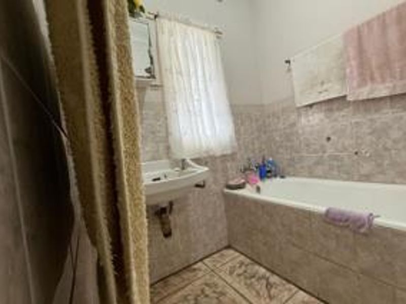 Spacious Richards Bay Central Home with Lush Garden Potential - Photo 9