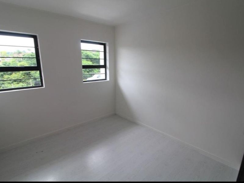 Modern Escombe Townhouse: Secure, Stylish, and Ready for You! - Photo 8