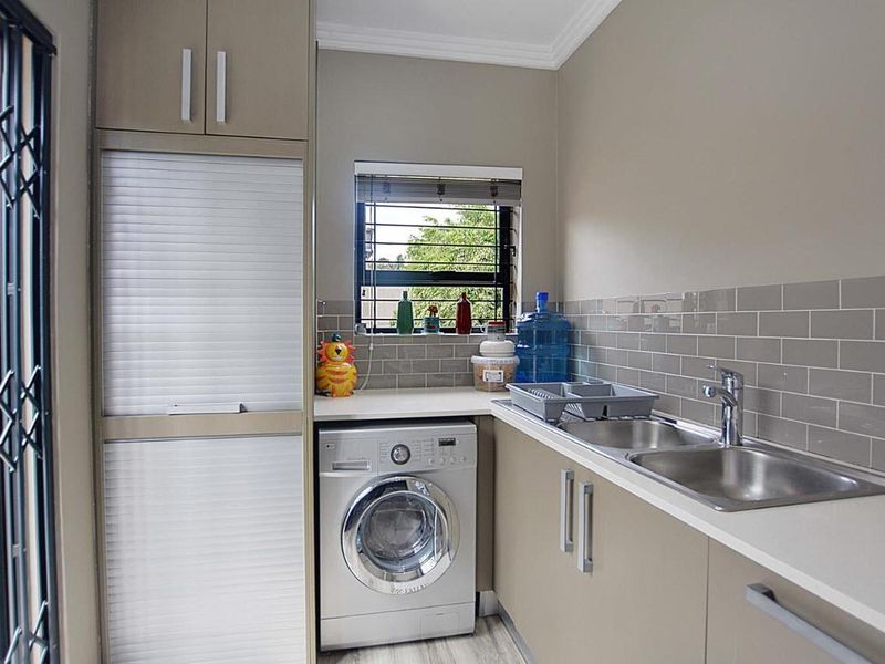 Exceptional 5-Bedroom Home with Versatile Studio in Flamingo Vlei - Photo 7