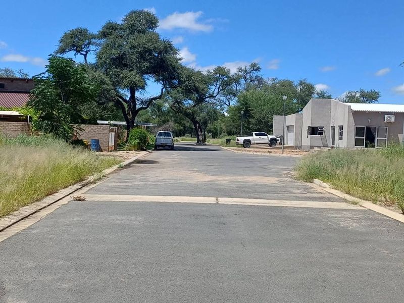 Build your dream home in the heart of nature! ✨ This beautiful vacant erf is situated in the sought-after Okakango River Estate, approximately 3km North-East of - Photo 3