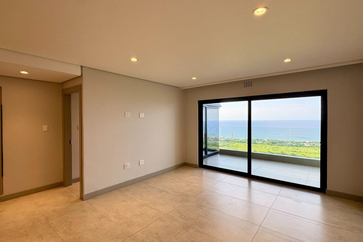 This is a premium, move-in-ready coastal apartment that combines luxury, security, and modern convenience in a sleek, never-before-lived-in space. - Photo 3