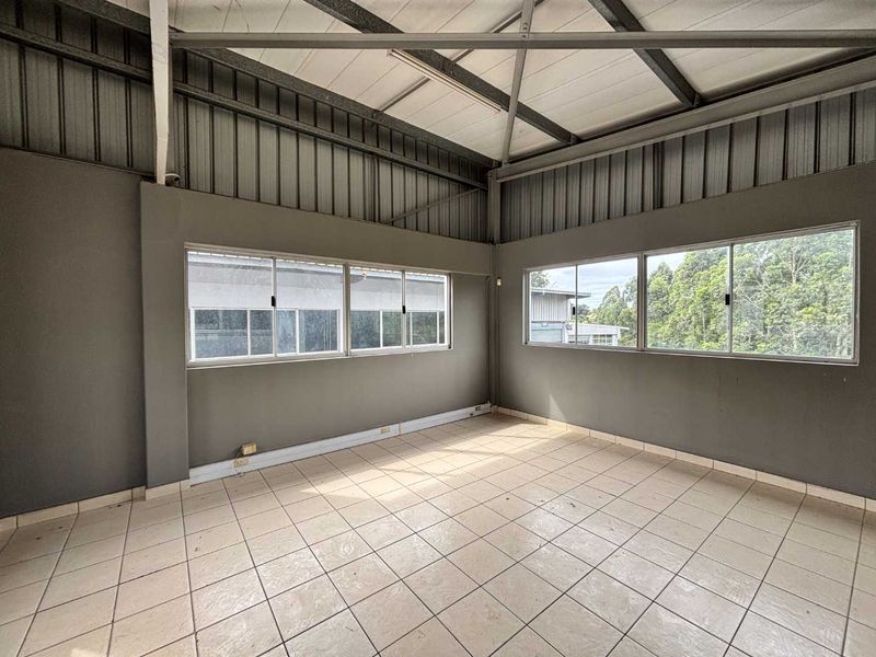 Neat Industrial Unit with Roller Door Access, Offices & Mezzanine Space - Photo 7