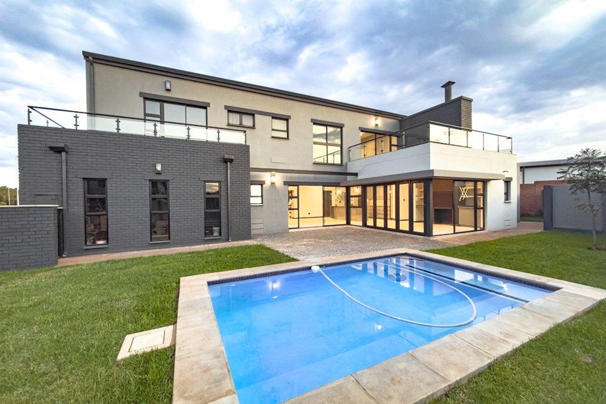 Overview  This modern double-storey home offers the perfect combination of style, privacy, and functional family living.  Designed with comfort - Photo 2