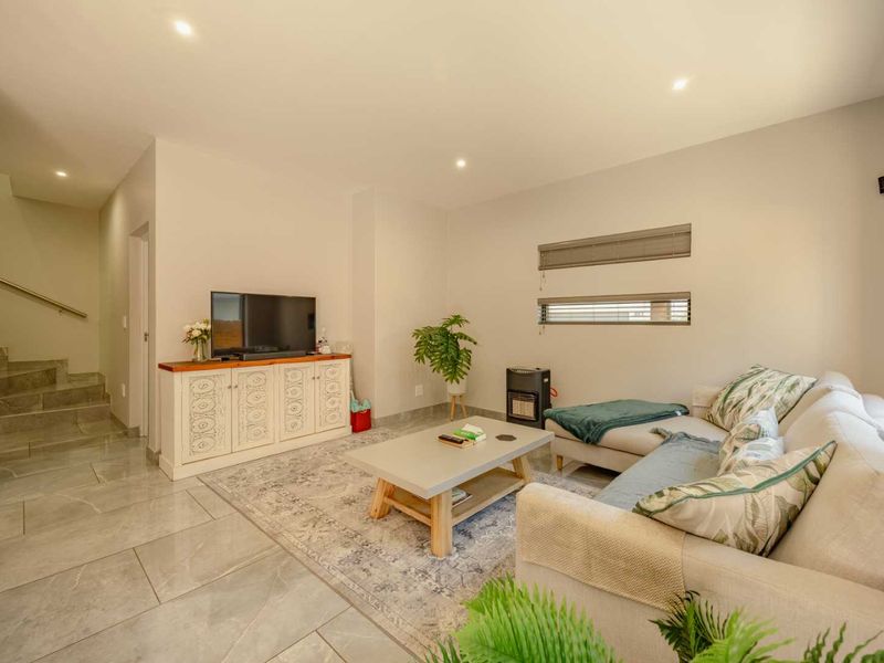 MODERN, SECURE & STYLISH LIVING – THE PERFECT LOCK-UP-AND-GO HOME** - Photo 7
