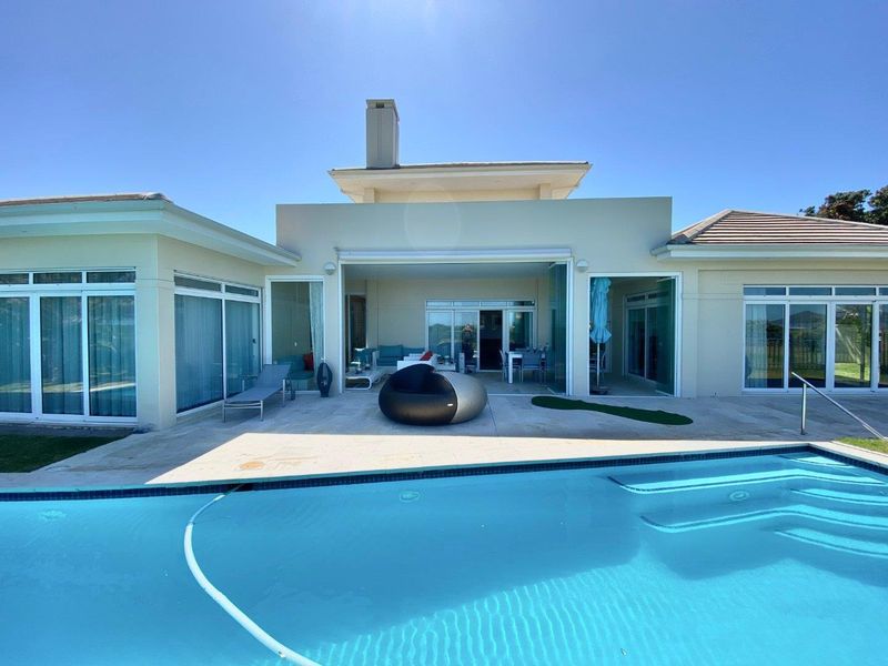 Fully Furnished Luxury beachfront home in Sunset Links Golf Estate - Photo 3