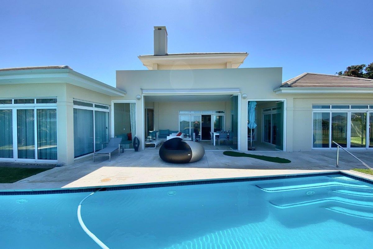Fully Furnished Luxury beachfront home in Sunset Links Golf Estate - Photo 3