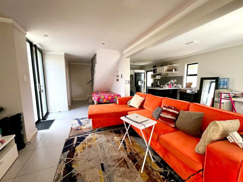 Spacious Double-Storey Townhouse in Secure Equestria Complex - Photo 2