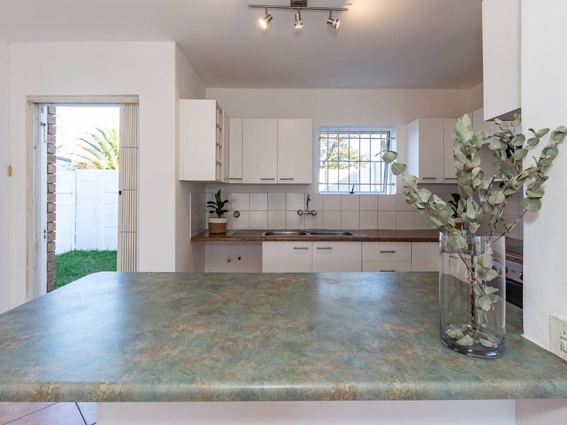 Elegant Double-Storey Living in a Secure, Sought-After Setting - Photo 6
