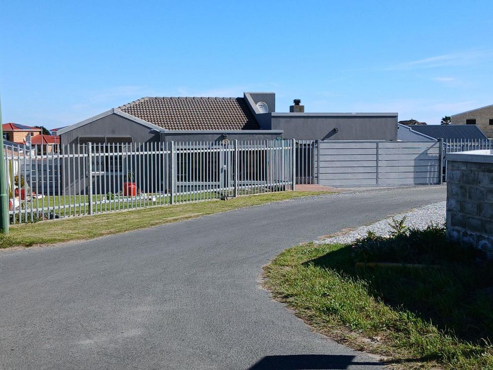 New House next to us - with our Plot starting on the right hand side of it.