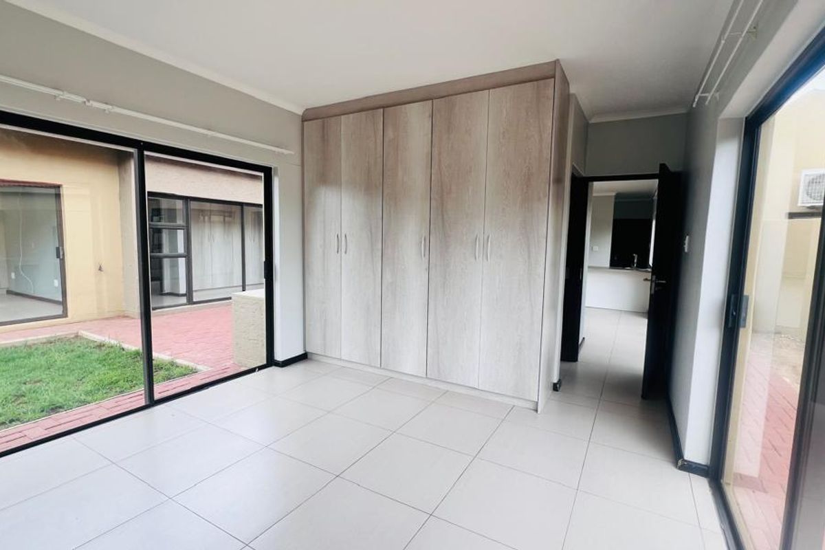 Welcome to a serene and secure haven in the heart of Camelthorn Estates in Okahandja! - Photo 4