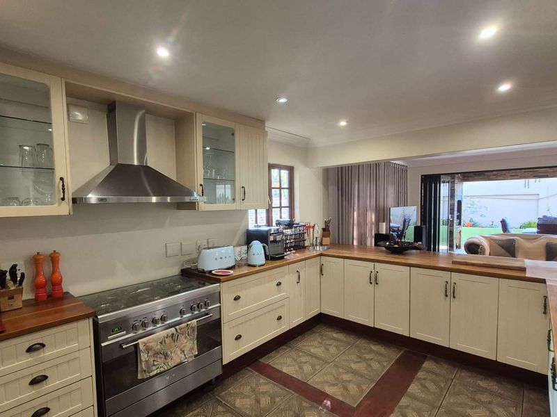 A Country-Style Family Haven with Separate Cottage in the Heart of Douglasdale - Photo 4