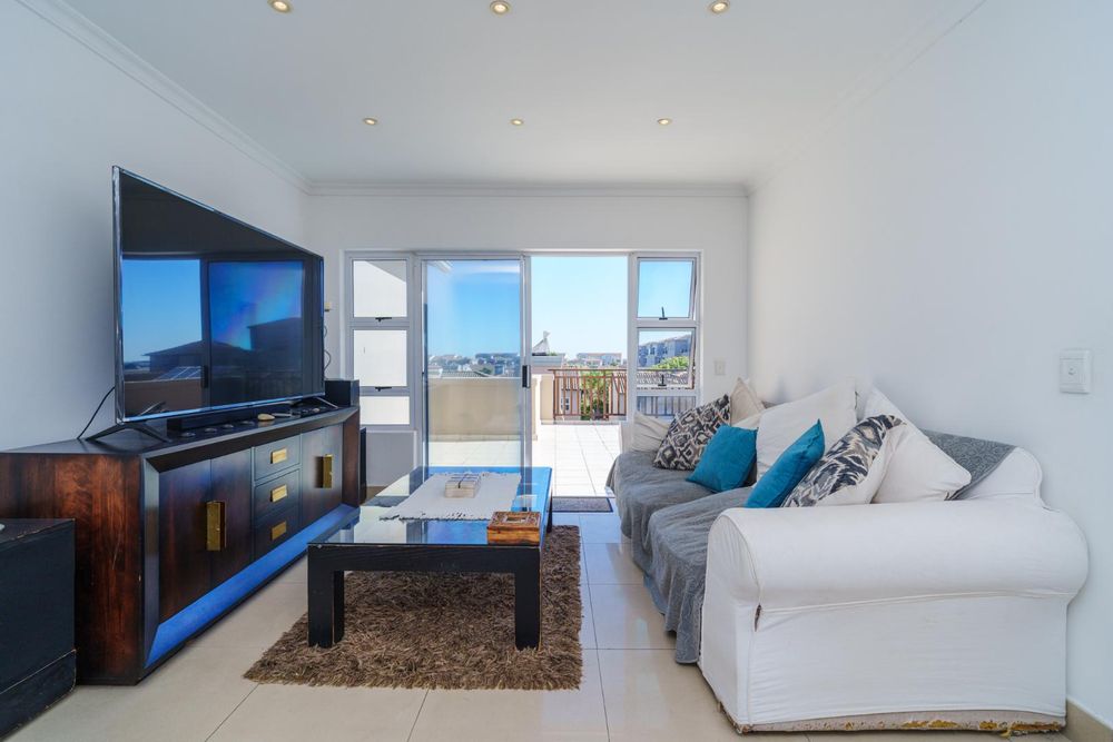 Upstairs lounge leading to top floor deck
