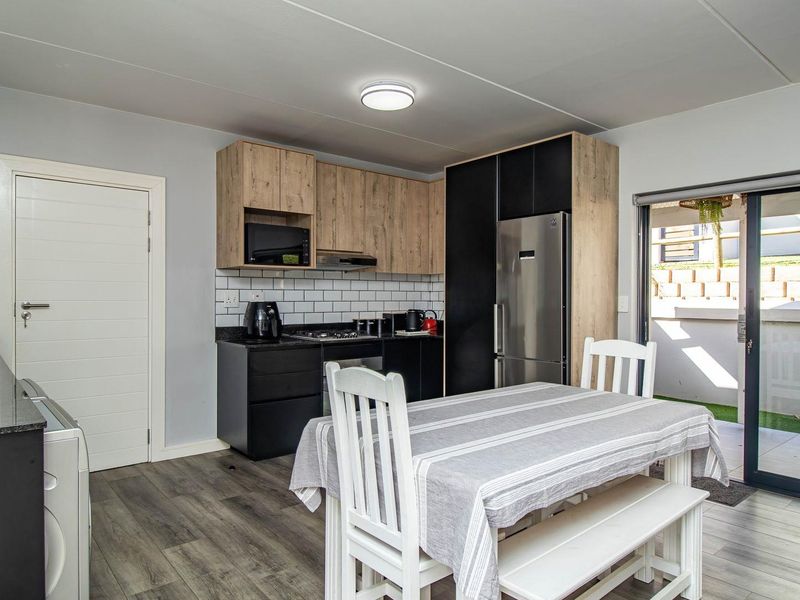 Charming Ground Floor Unit at Hartland Villas - Photo 6