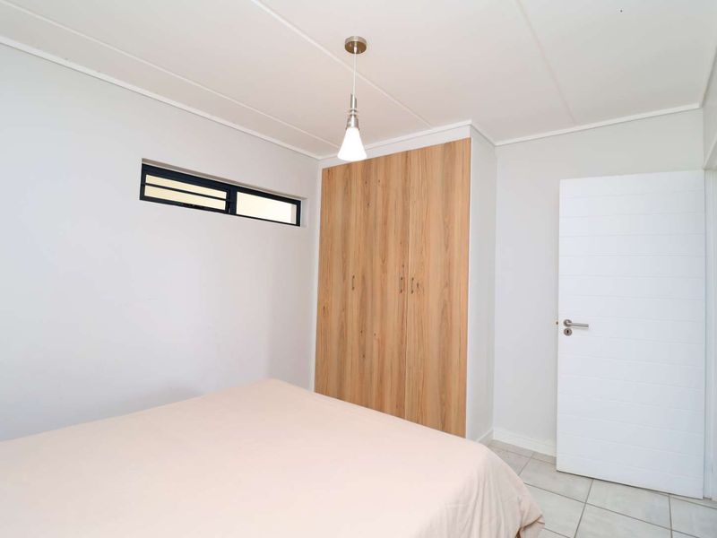 Modern 2-Bedroom Apartment with Balcony in Greenlee Eco Estate - Photo 10