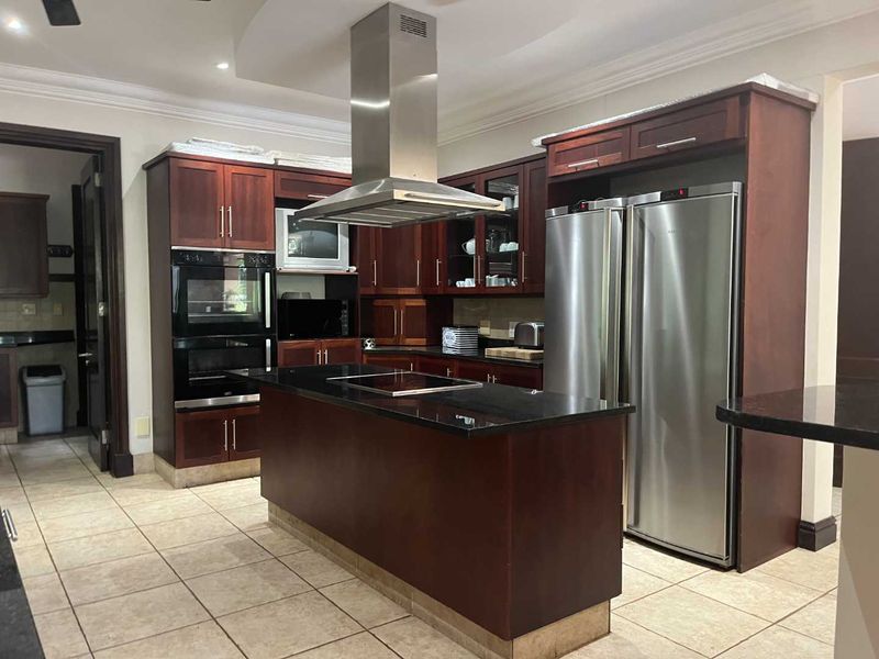 A home offering an exceptional blend of luxury, comfort, & nature, making it the perfect place to call home. - Photo 4