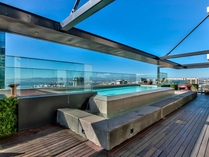 Elevated City Living | 16 On Bree Studio with Balcony, Pool & Views - Photo 6