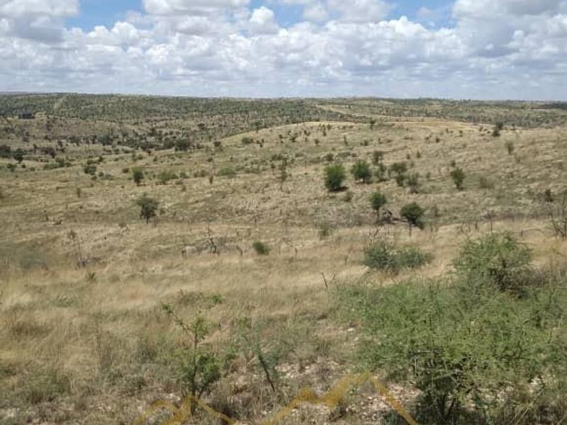 Expansive view of the natural landscape and open veld terrain characteristic of the small holding property.