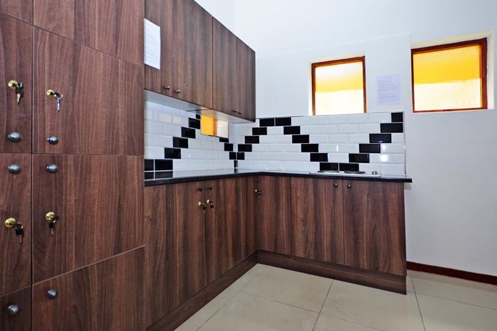 Lockers and stove top in communal kitchen