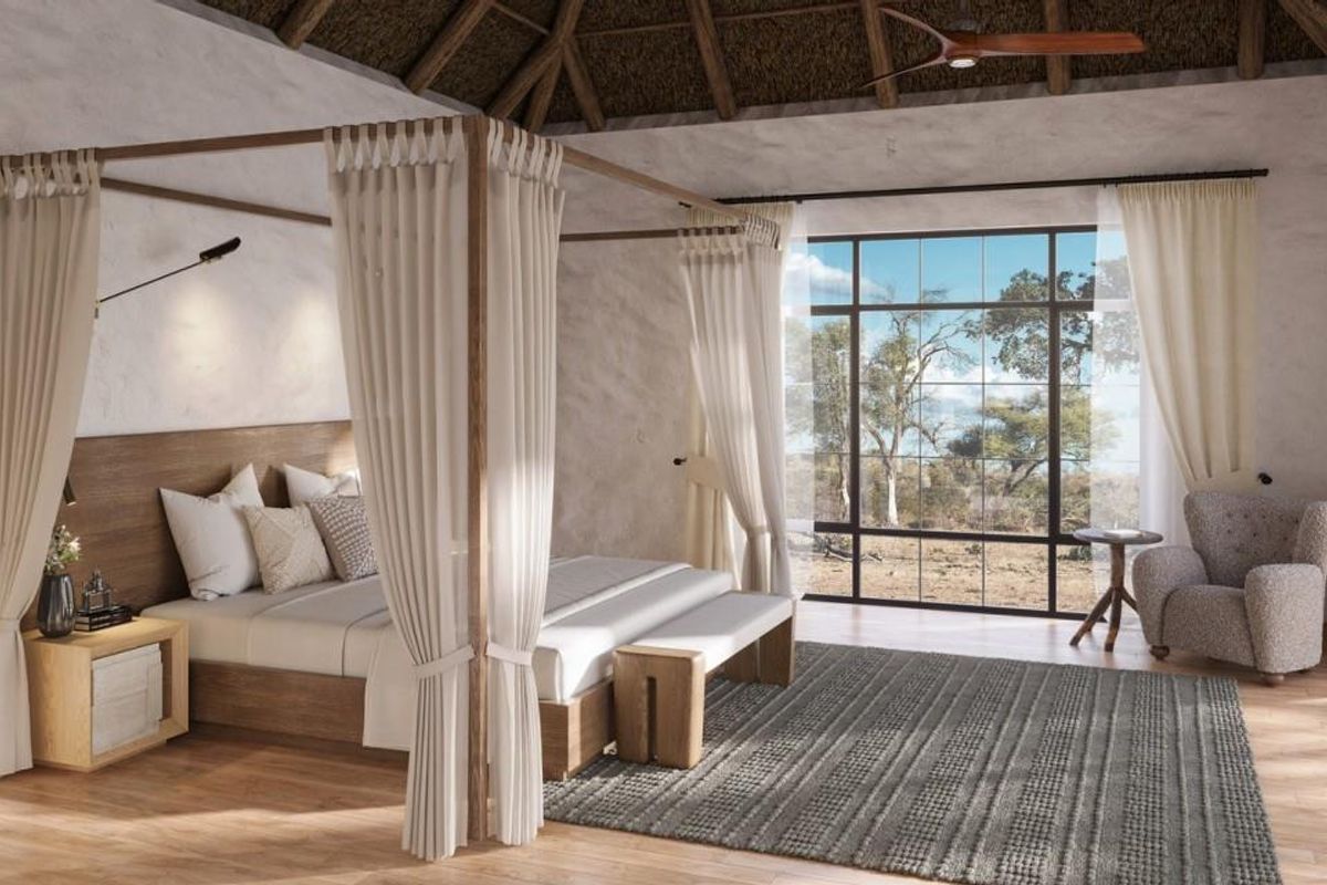 A spacious bedroom featuring a high thatched ceiling, large industrial-style windows with natural views, and warm timber flooring.