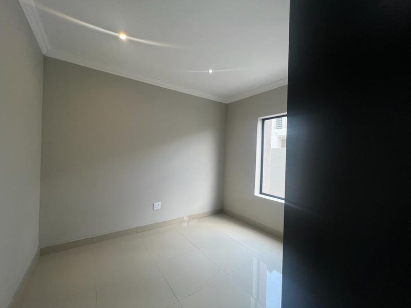 Elegant 4-Bedroom Home in Zambezi Manor Estate - Photo 9