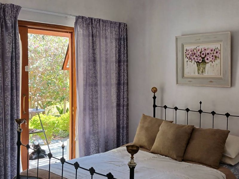 A tranquil setting complements this well established home - Photo 9