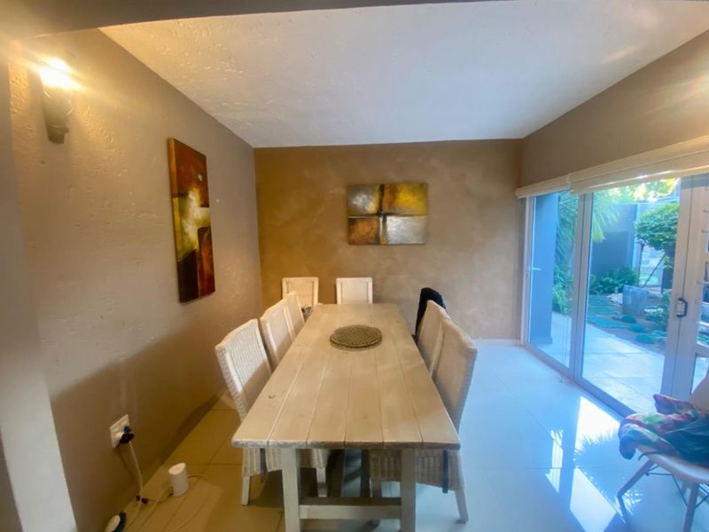 Elegant Ground-Floor Unit with Private Garden in Sought-After Complex - Photo 5