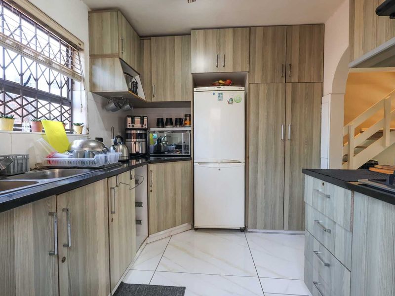 Stylish 3-Bedroom Duplex- Entertain In Style with Private Garden and Built In Braai - Photo 7