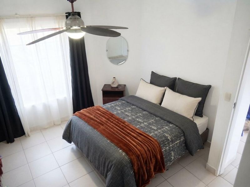 Exceptionally Secure Two-Bedroom Townhouse with Private Garden Retreat - Photo 10