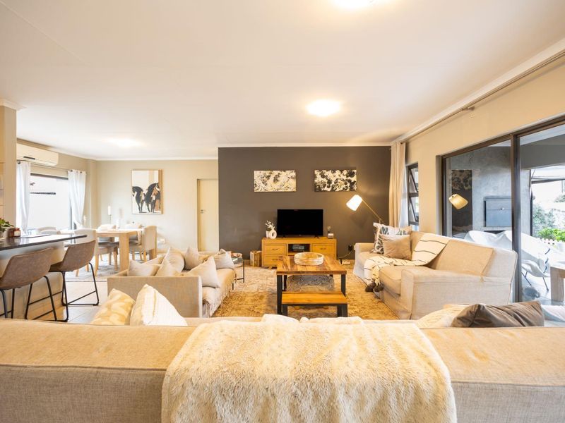 1. Charming 3-Bed Family Home with Pool in Pretoria East   2. Spacious Meadows Estate Home with Built-In Bar & Boma   3. Entertainers’ Dream: Patio, Pool & Outd - Photo 8