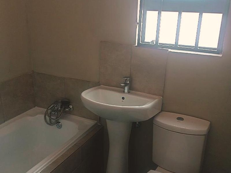 3-Bedroom Home To Let in Secure Boomed-Off Area with Biometric Access – Dawn Park – R7,000 per Month This well-maintained three-bedroom home - Photo 5