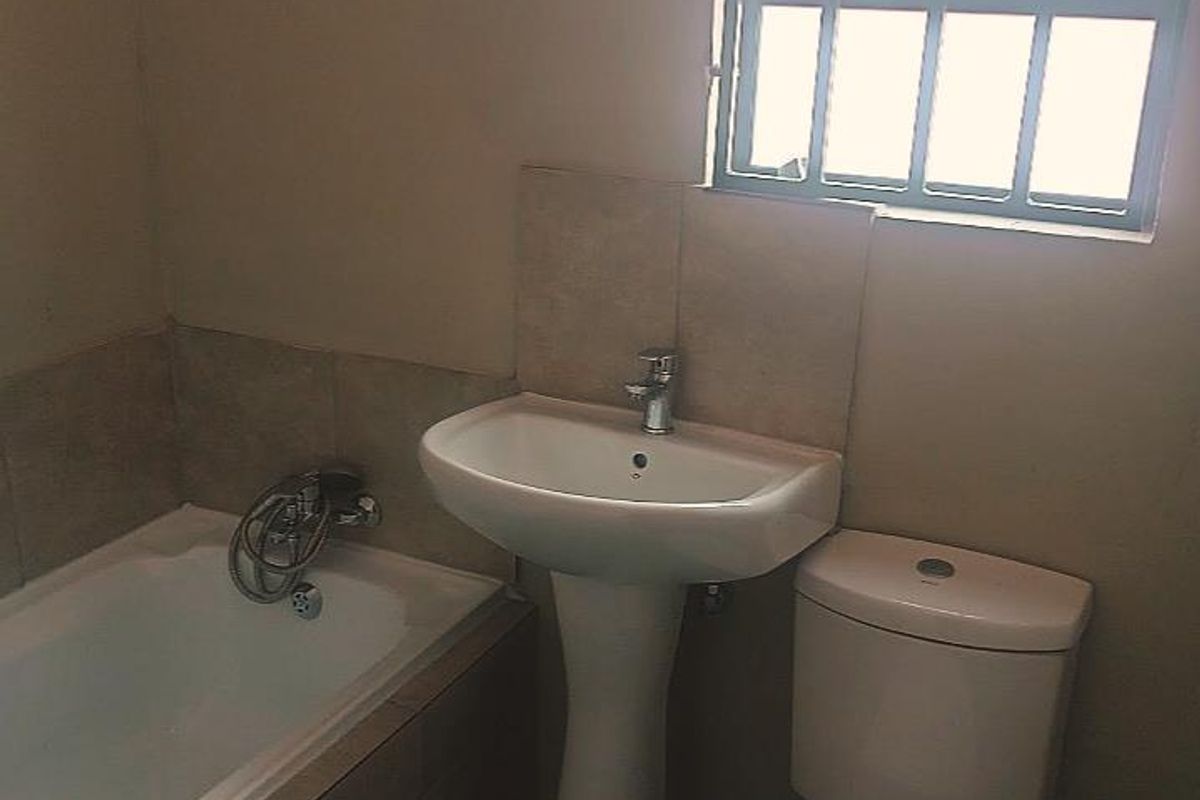 3-Bedroom Home To Let in Secure Boomed-Off Area with Biometric Access – Dawn Park – R7,000 per Month This well-maintained three-bedroom home - Photo 5