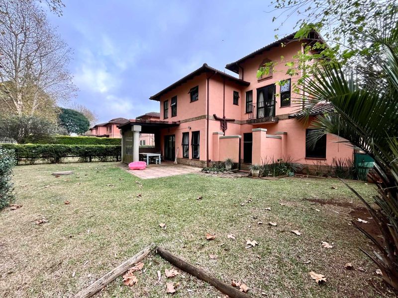 Spacious Pet-Friendly Duplex in Sought-After Plantations Estate - Photo 1
