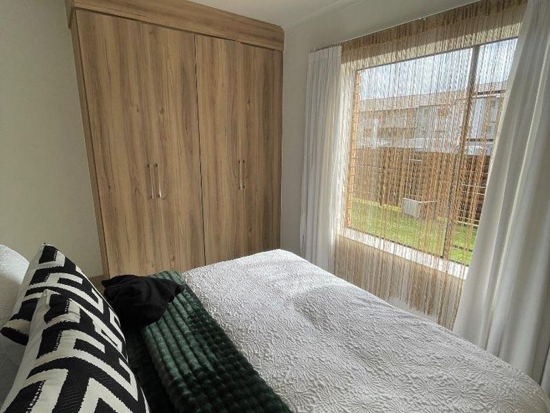 Family-Friendly 4-Bedroom Rental with Outdoor Play Area - Photo 9