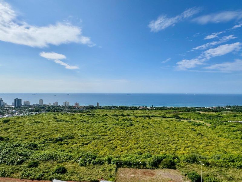This is a premium, move-in-ready coastal apartment that combines luxury, security, and modern convenience in a sleek, never-before-lived-in space. - Photo 1