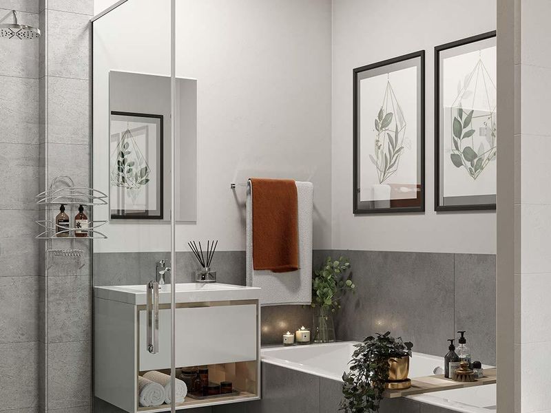 Modern bathroom featuring a wall-mounted vanity, built-in bathtub, and a glass-enclosed rain shower with contemporary grey tiled finishes.