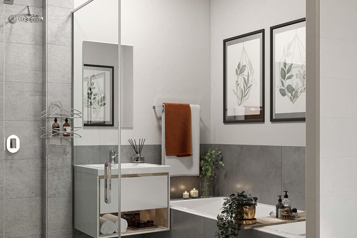 Modern bathroom featuring a wall-mounted vanity, built-in bathtub, and a glass-enclosed rain shower with contemporary grey tiled finishes.