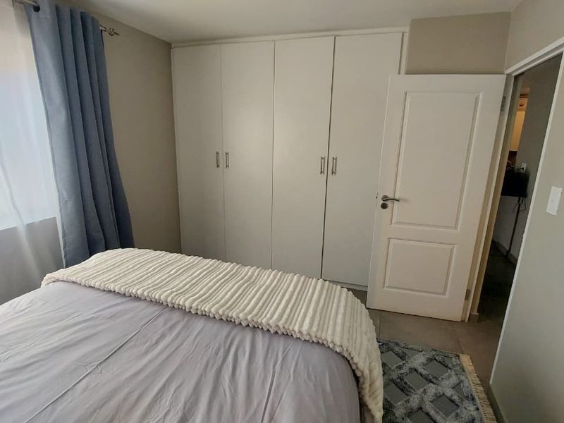 Cozy 2-Bed Ground-Floor Unit with Private Patio & Storage - Photo 9
