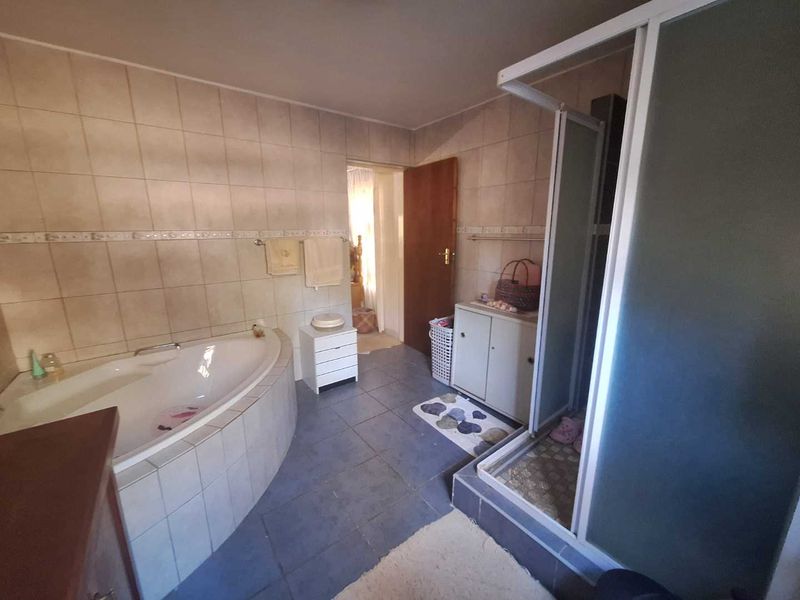 Charming Double-Story Home with Modern Amenities and Eco-Friendly Features - Photo 10